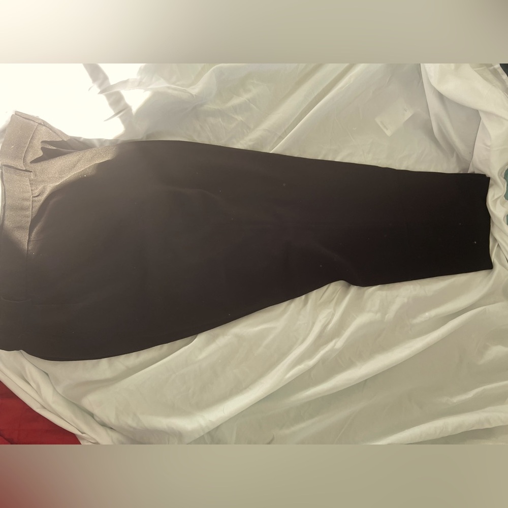 Black no tags, 30 inch pants with zipper and buttons. K.